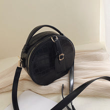 Textured stone shoulder bag