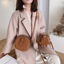 Textured stone shoulder bag