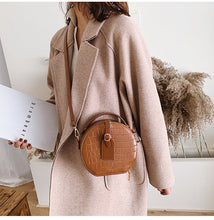 Textured stone shoulder bag